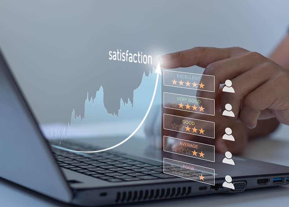 Digital composite image of a person's hand touching a laptop screen displaying a customer satisfaction rating interface with stars, alongside an upward trending graph labeled 'satisfaction'.