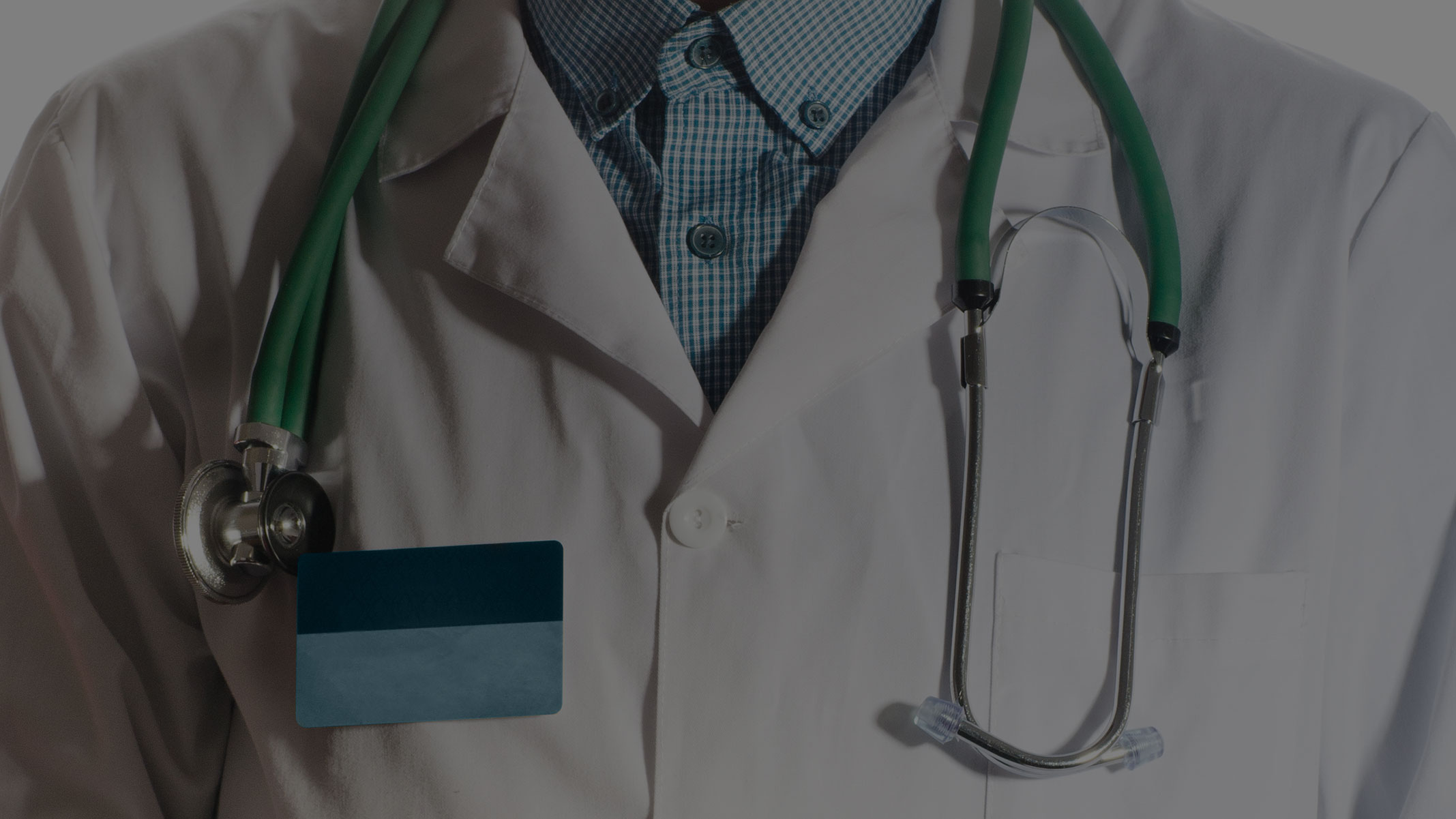 Close up of doctor with white coat and stethoscope