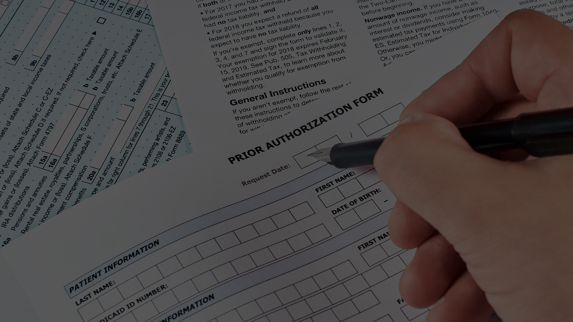Reducing Administrative Burdens with Automated Prior Authorization Close up image of a person writing on a form titled "Prior Authorization Form"
