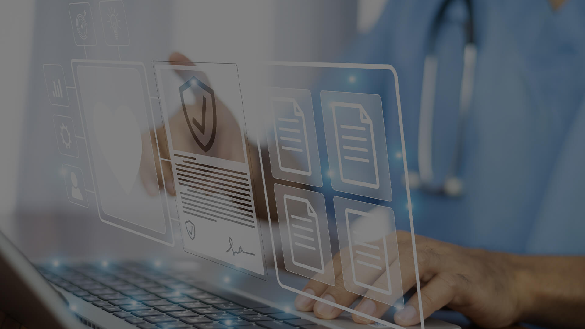 Physician types on laptop while also clicking on a holographic image that floats above the laptop