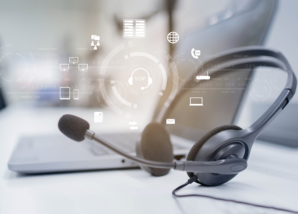 call center outsourcing | image of headset and laptop with icons floating in front of them