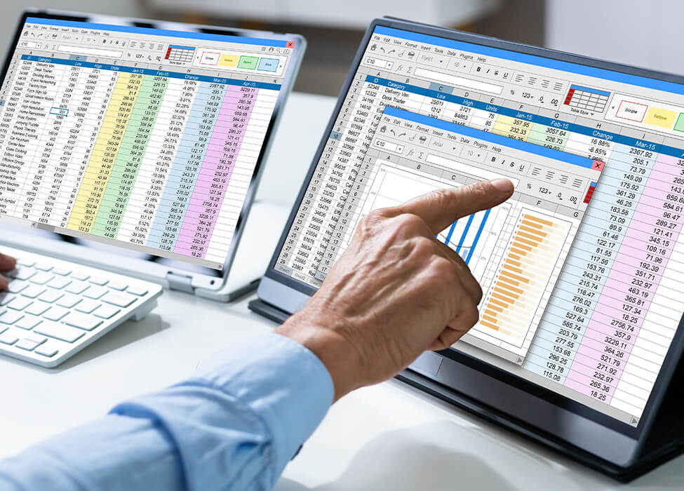 Healthcare provider pointing at detailed medical coding analytics on a computer screen, emphasizing RVU financial optimization and accuracy in medical billing for healthcare providers.