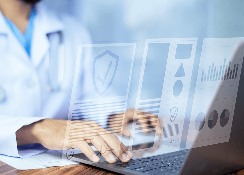 A healthcare professional working on a laptop displaying security and data analytics, symbolizing modern digital healthcare management.